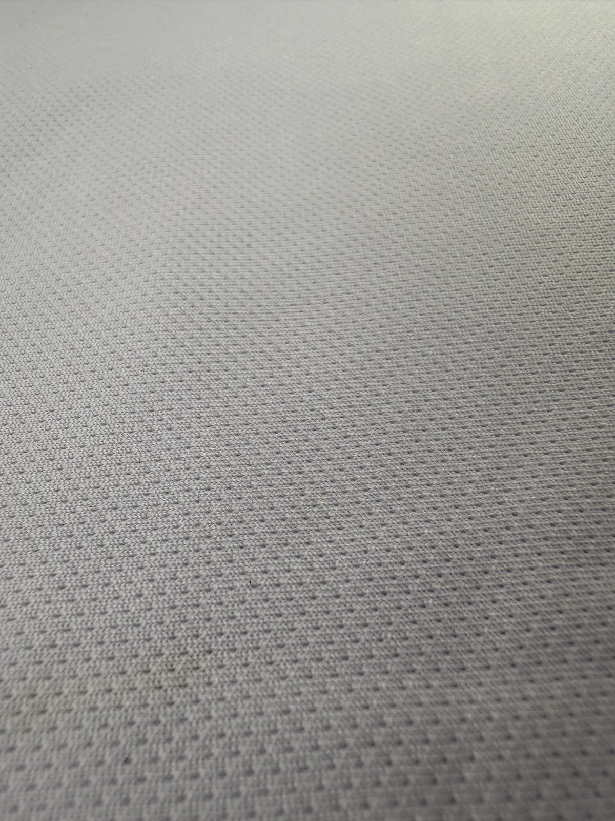 Detail sampel kain Brazil polos